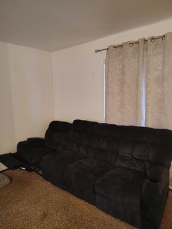 Black recliners with cup holders