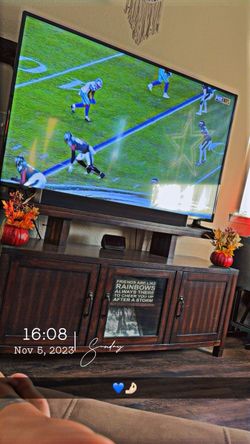 Real wood entertainment center.