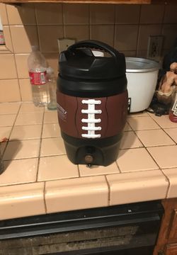 A football shaped cooler