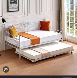 Twin size bed with trundle