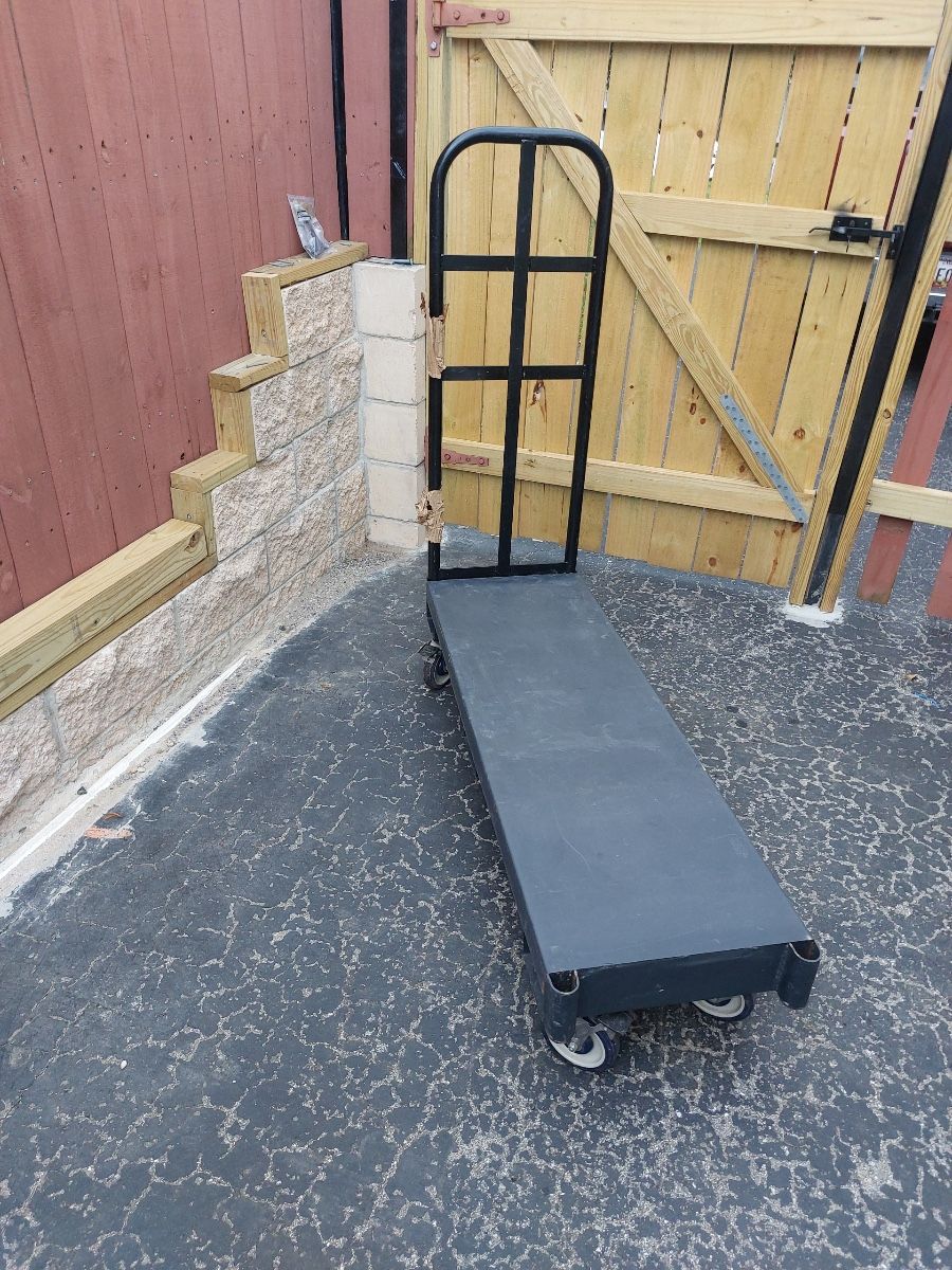 Used moving carts in good condition, 14 inches wide by 54 inches long, holds over 5,000 pounds of weight