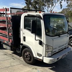 2012 Isuzu NPR-HD, 16’ft steak bed,
