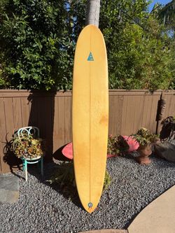8’8” Ace surfboard longboard