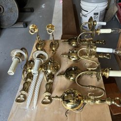Antique style gold coloured candle holders.
