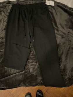 New black ‘NEER’ sweatpants/joggers