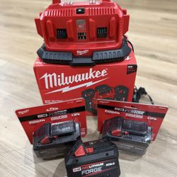 Milwaukee Six Pack Charger. Also Throwing In Three Brand New Milwaukee Batteries. FORGE.. 8-0.. $540