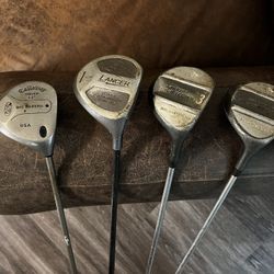 Old Drivers, Woods, And Putter
