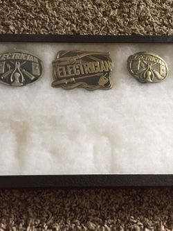 Electrician belt buckles