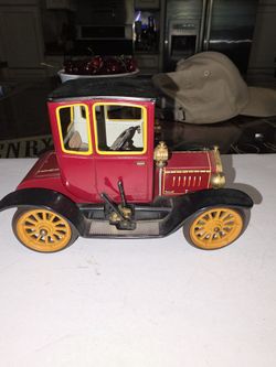 Vintage Ford toy car.