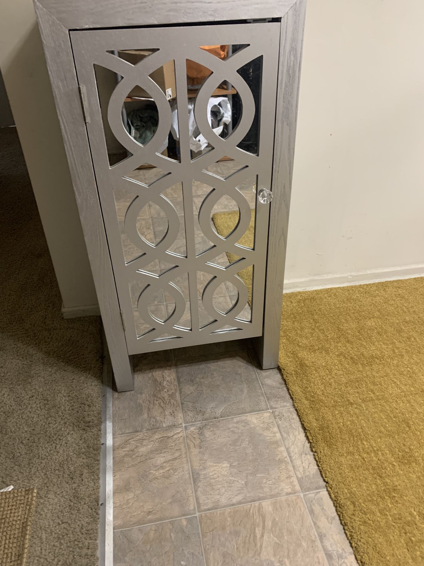 Armoire Silver Cabinet With Matching Vase