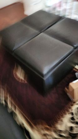 Black leather ottoman with storages