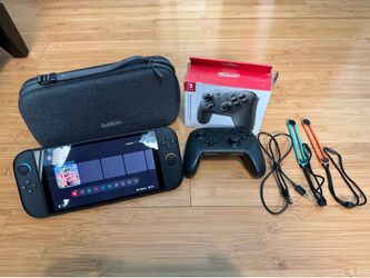 Nintendo Switch 2 + Pro Controller + Case (Blue/Red 256GB)