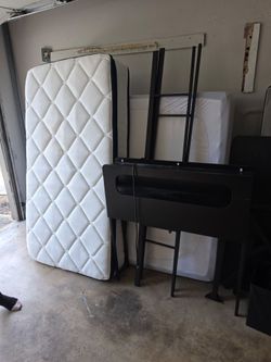 Twin Mattress with Black Bed Frame