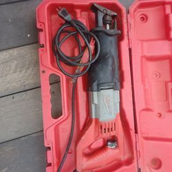 Electric.saw Zal and pneumatic nail gun.