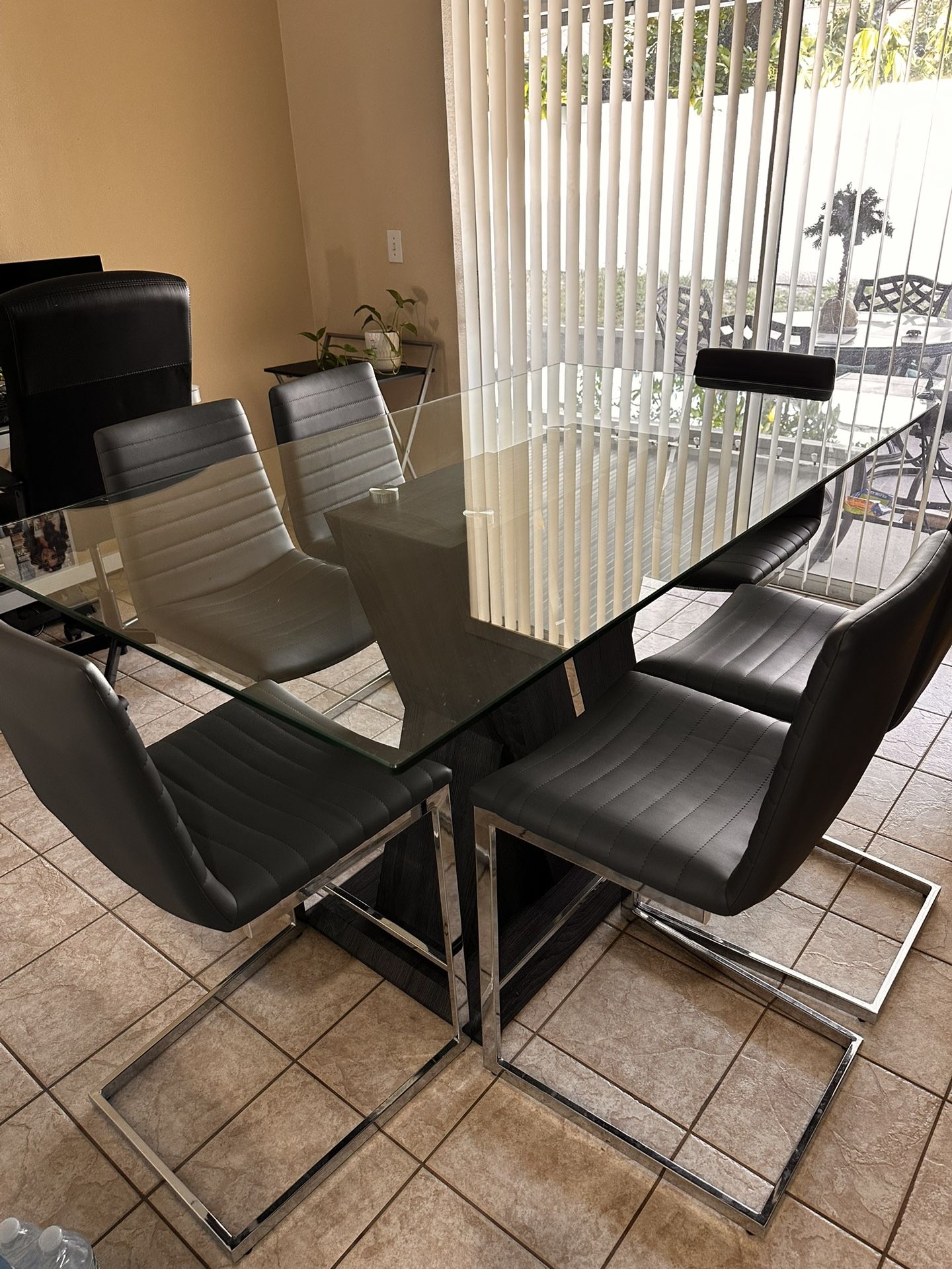 Beautiful Glass And Wood Based Dining Room Table With 6 Chairs