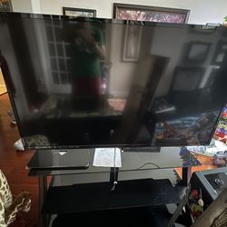 Vizio 60” Flat Screen TV & Wood & Glass Stand