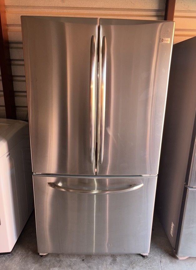 GE Stainless Steel Refrigerator And Freezer
