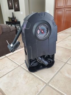 Portable tire inflator
