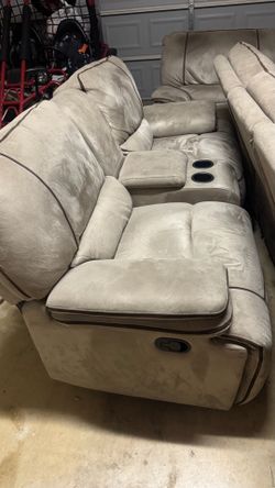 Manual reclining living room set .