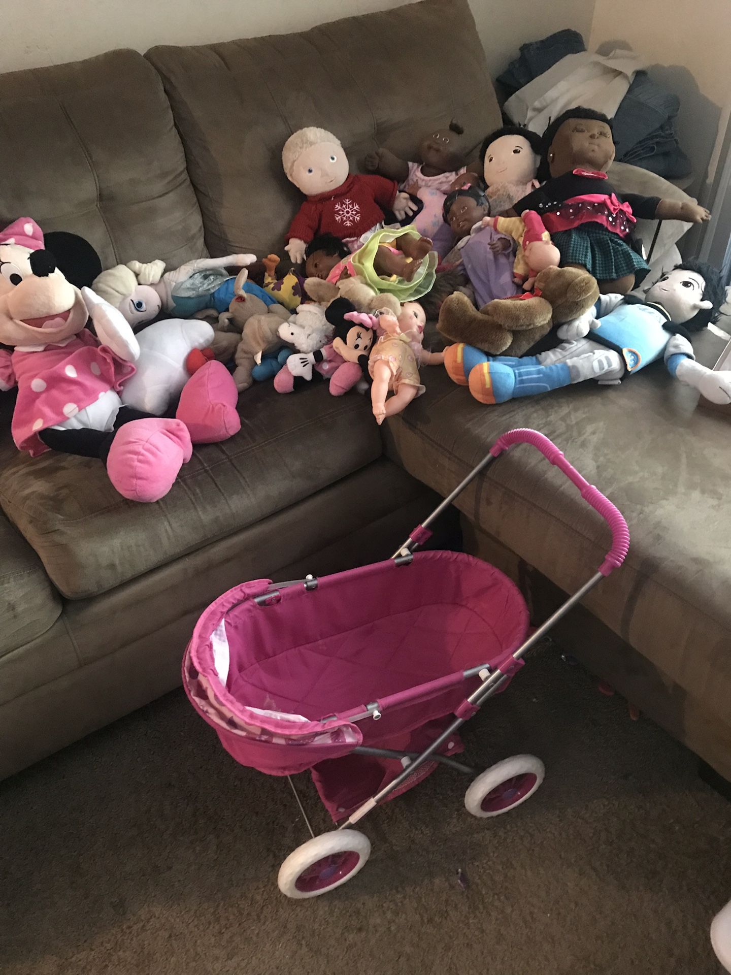 Dolls, stuffed animals, and buggy