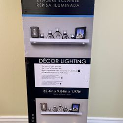 Brand new Studiosync lighted floating shelf