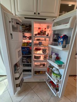 Used LG side by side refrigerator