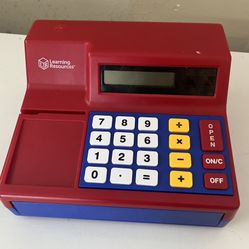 Toy cash register (fake money) and phone