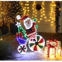 36 in. Multi-Color Fabric Yard Sculpture Christmas Santa on Peppermint Bike Holiday Decoration