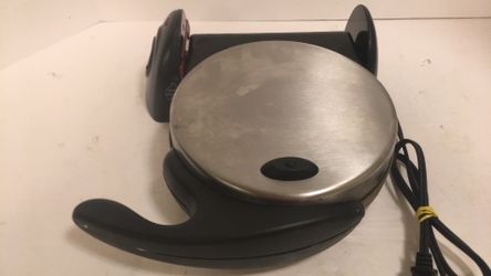 Presto Flip Side Waffle Maker Stainless Steel Model# 0351994 tested and working. Does need a good cleaning on exterior however interior is nice and cl