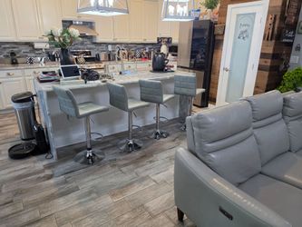 Premium leather elec couch & loveseat w/ 4 matching bar stools