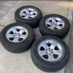 4 X 275/65r18 6x5.5 6x139.7 Ram 1500 Stock Rims With Good Tires Treads!