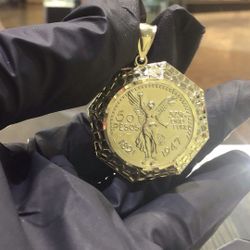 10k Gold Solid 50 Pesos Pendant Available In Stock..