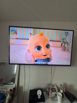 Tv fla screen 75 inch with Xbox  one X