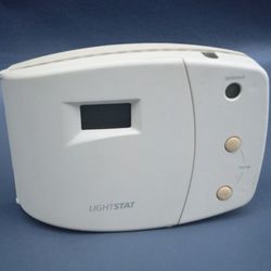 Lightstat TME thermostat light-sensing, automatic night setback thermostat. 1 Packs