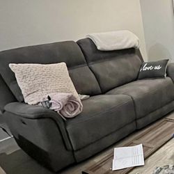 Reclining electric sofa with charging USB outlets & neck support feature