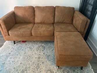 Brown faux leather sofa with ottoman