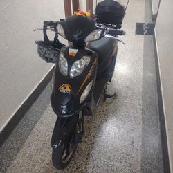 This Is A Very Nice Beautiful Electric Scooter Everything Complete Please Lights No Problem Extra Battery 48 Volts 10000 MAh  Negotiable