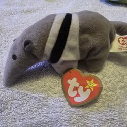 This is a Ty Teenie Beanie Baby, "Antsy the Anteater", which was a McDonald's Happy Meal promotional item. 