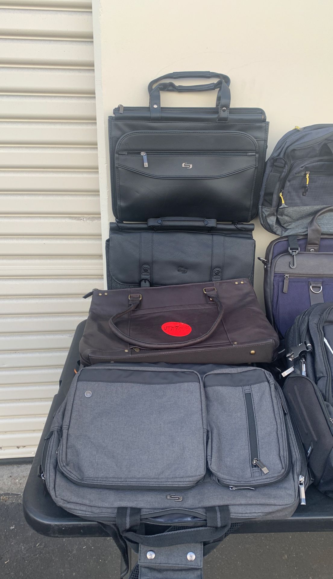 Various solo laptop backpacks/bags.