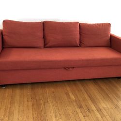 Red IKEA Friheten Sleeper Sofa bed