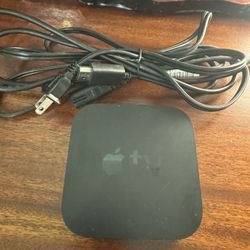Apple TV adapter excellent condition with cables.