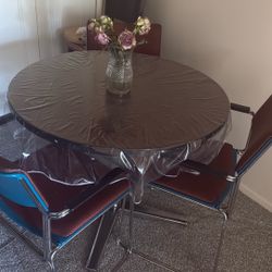 Dining table with three chairs