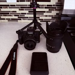 Canon EOS M5 Bundle – 2 Lenses (Sigma 18–250mm w/ Case) + Tripod + Battery – Excellent