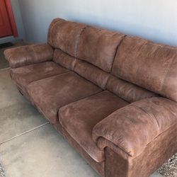 Brown leather couch Queen sleeper