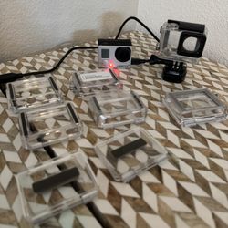 GoPro Hero 3+, Sunpak Action Video Grip, LowePro Camera Backpack 