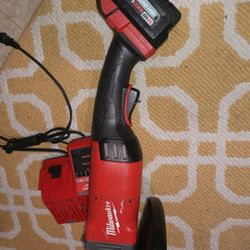 Milwaukee M18. Fue l7"-9"  Grinder Charger And 6.0 High Input Battery