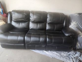 2 Faux leather couches.