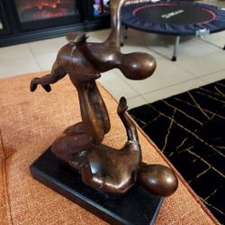 Bronze Abstract Sculpture Of Parent And Child On A Solid Black Marble Base