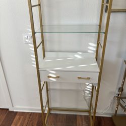Metal Bookcase With Glass Shelves And Drawer With Power Outlets