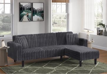 Gray soft plush sectional couch converse to bed